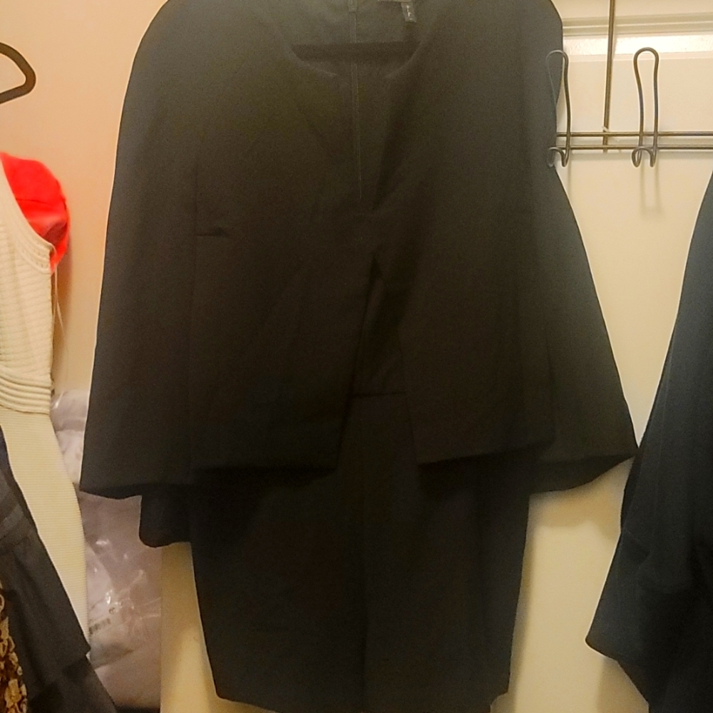 Black cape skort suit